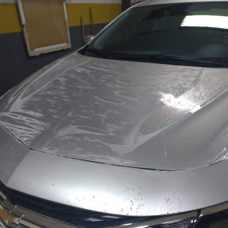 Paint protection film on hood of Chevy Malibu